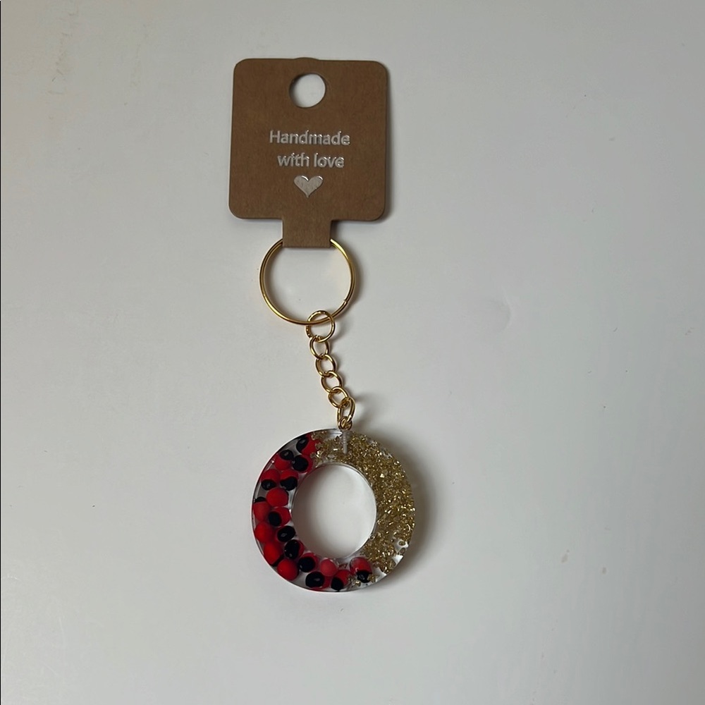 Huayruros Handmade keychains. Chakra, Luck, Protection and Prosperity